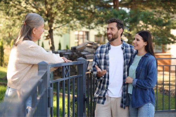 people-talking-over-fence